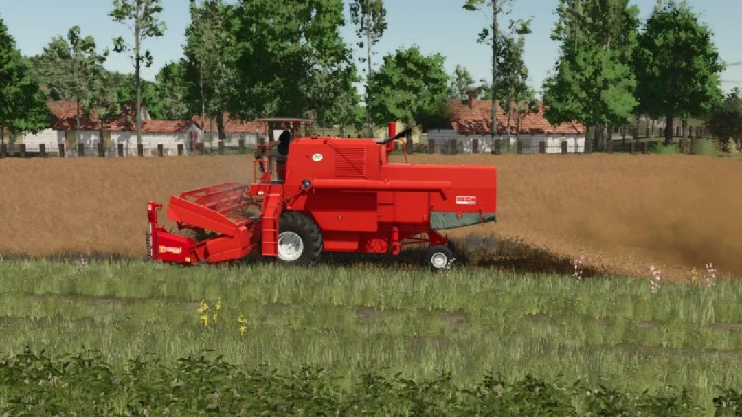 FS25 mods: Red Bizon Z056 harvester working in a field in Farming Simulator 25.