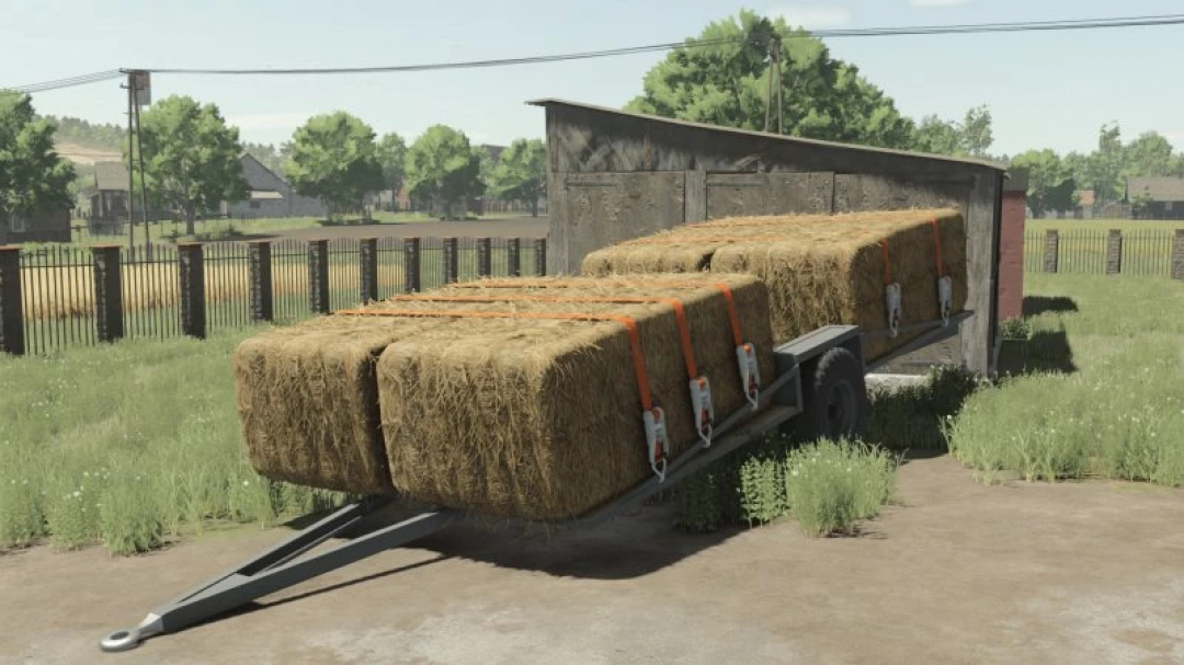 FS25 Old Bale Trailer mod with hay bales in Farming Simulator 25.