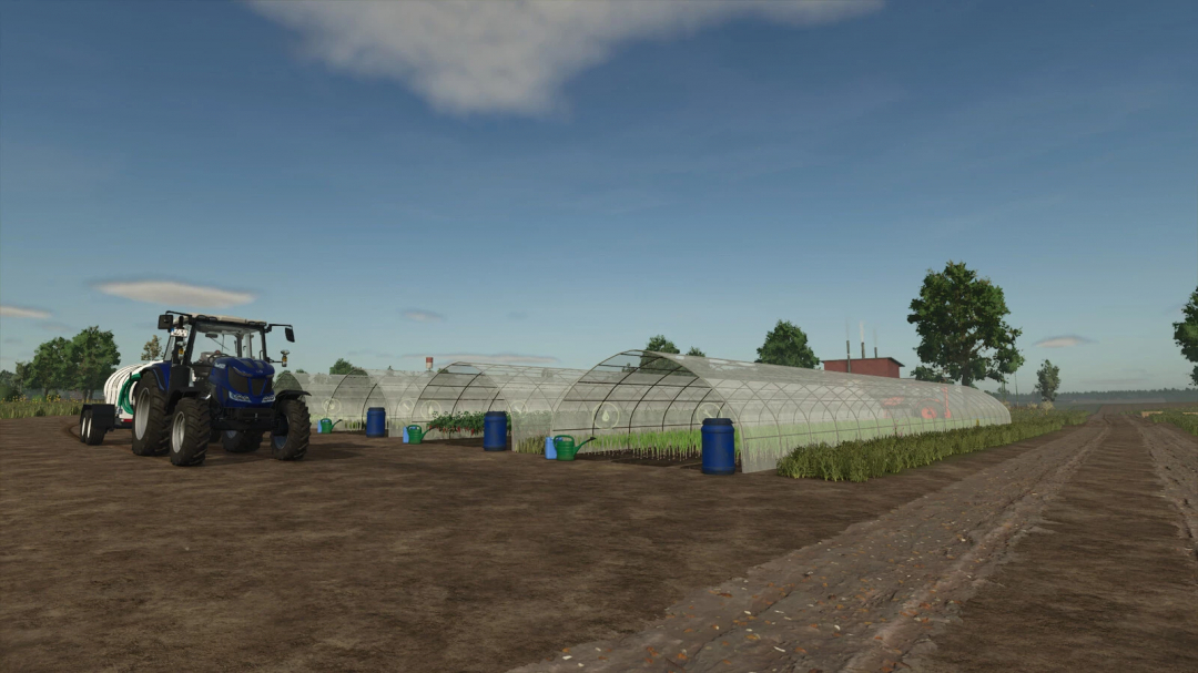 Foil Tunnel mod in FS25 with a tractor and greenhouses in a field.