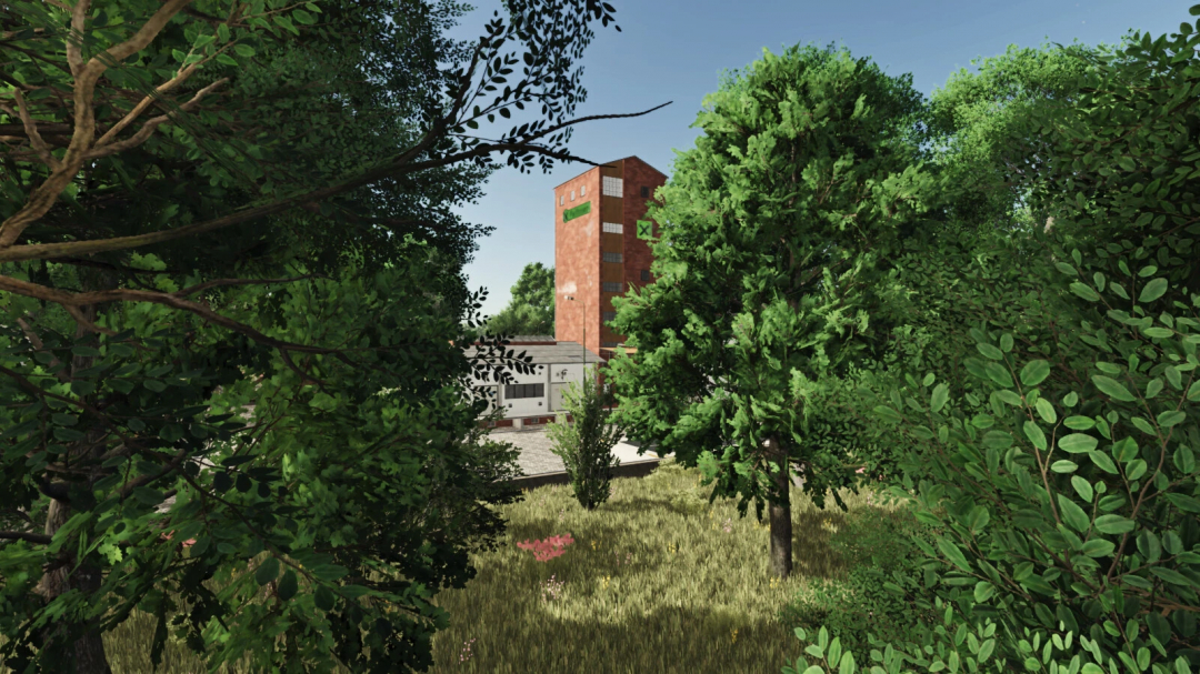 Lush green trees surround a red brick building in FrechDachs Map mod for FS25.