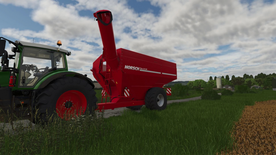 FS25 mod Horsch Titan 34 UW trailer on a tractor in a grassy field, part of Farming Simulator 25 mods.