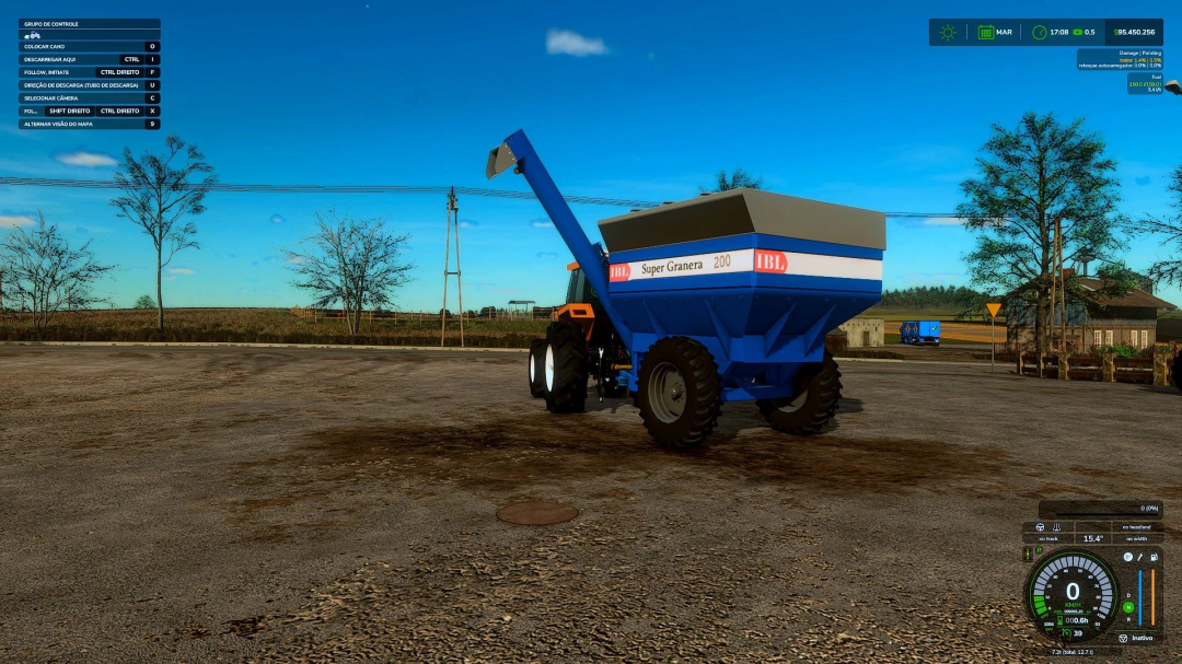 IBL Granera 200 mod in FS25 featuring a blue grain trailer attached to a tractor, set against a rural backdrop.