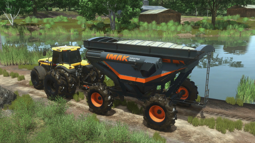 IMAK Grain Trailer CG 28500 mod in FS25 attached to a tractor near a pond.