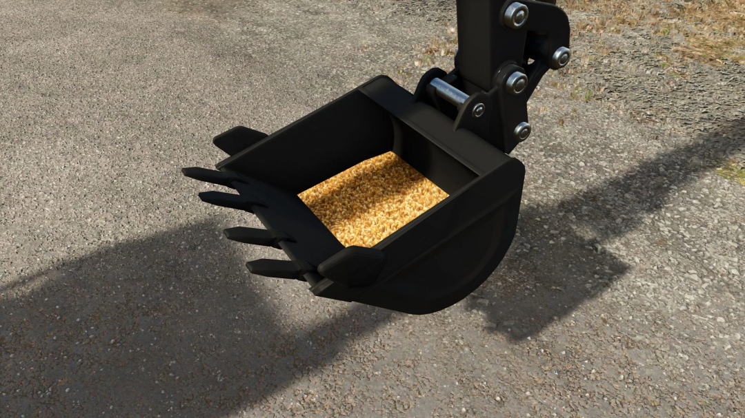 Close-up of a John Deere 50G bucket carrying grains in FS25 mod.