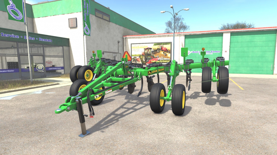 John Deere 915V-Ripper mod for Farming Simulator 25 in front of a tractor service center.