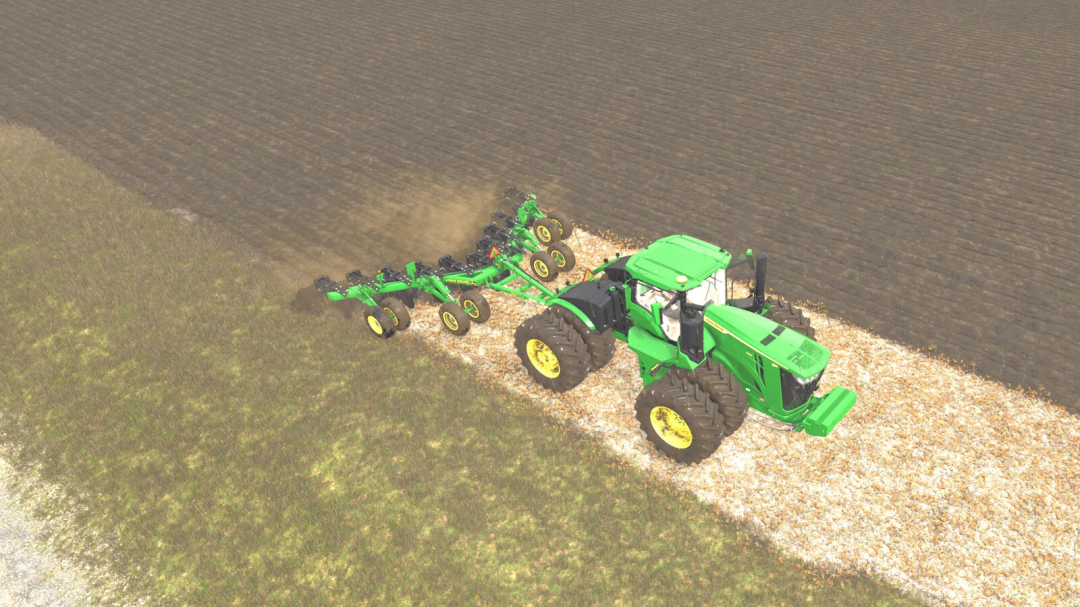 John Deere 915V-Ripper mod in FS25 plowing a field.