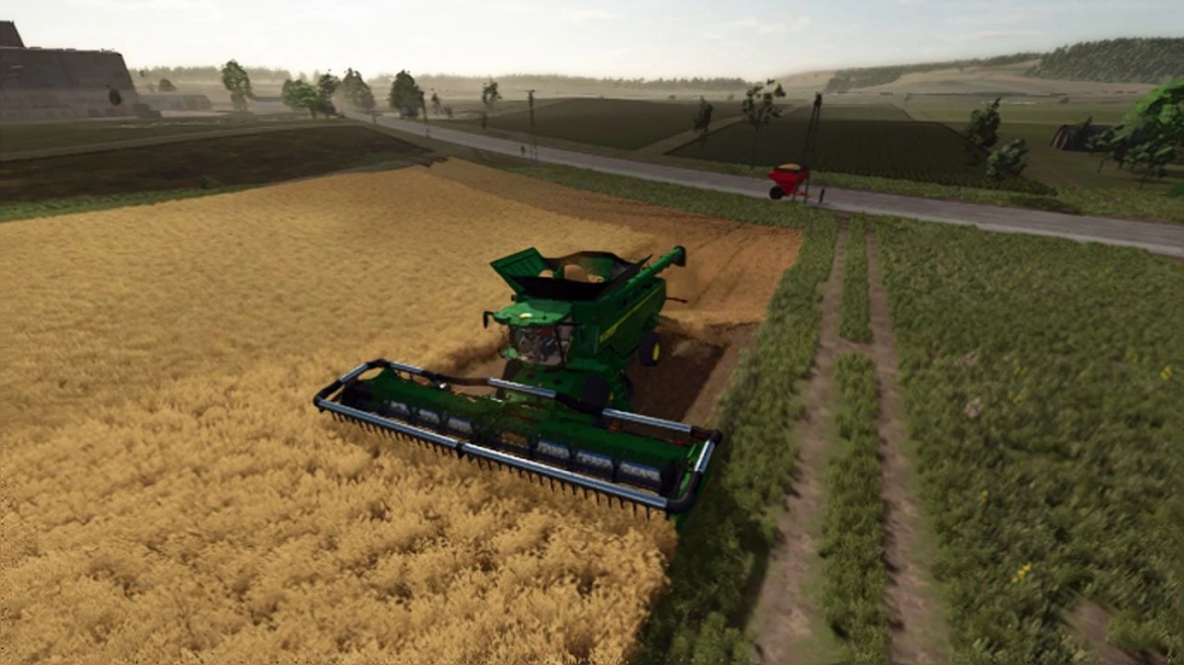 John Deere HD50F harvester mod in FS25, harvesting wheat in a vast field.