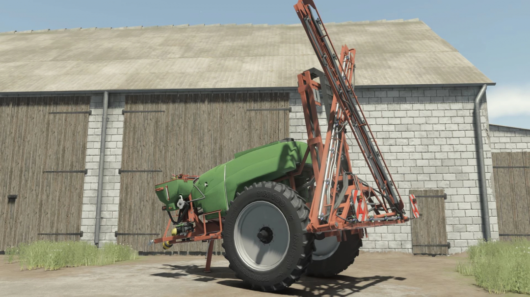 FS25 mod KFMR Krukowiak Apollo 1000/15/PHX in front of a barn in Farming Simulator 25.