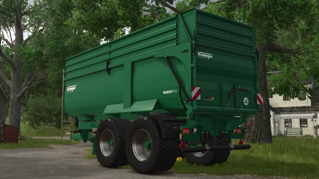 Krampe BigBody 750 trailer in FS25 mod, showcasing its green design in a farm setting for Farming Simulator 25.