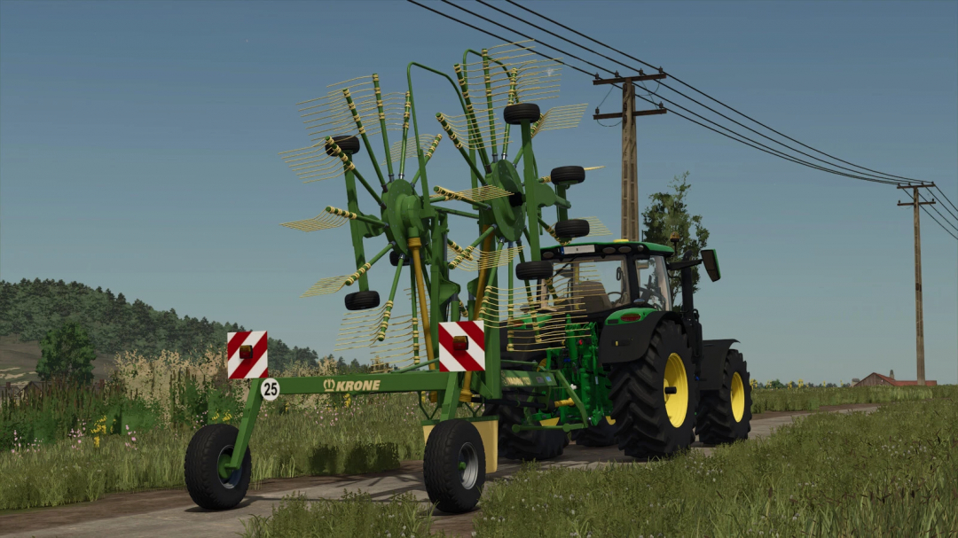 FS25 mod Krone Swadro 900 v1.0.0.0 showing a green agricultural rake attached to a tractor on a rural road.