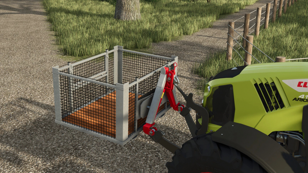 Lizard Coupler Triangles mod in FS25 showing a metal basket attachment on a tractor.