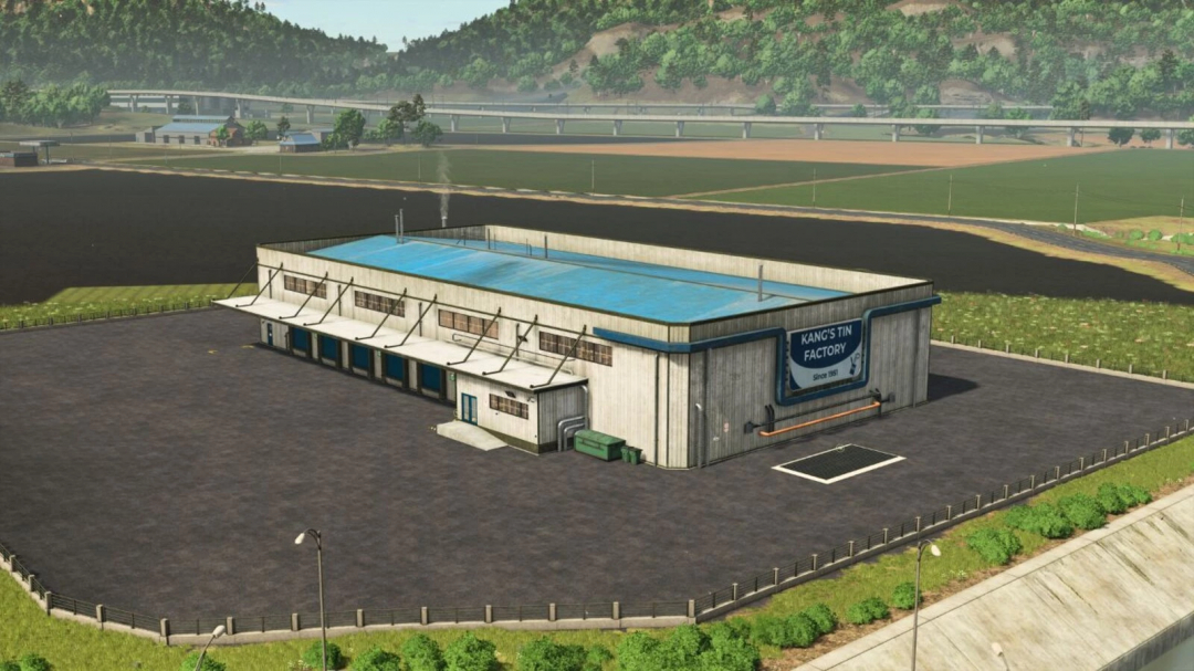 Logistics Center mod in FS25 with industrial building and surrounding landscape.