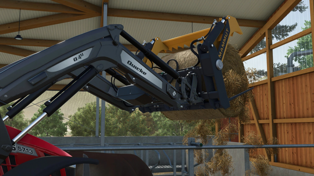 Mammut Equipment Pack mod for FS25 showing detailed machinery lifting hay bale in barn.