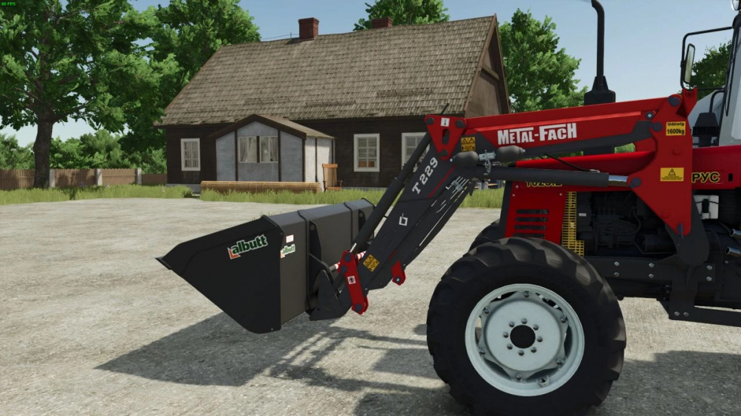 FS25 mod Metal Fach T229 v1.0.0.0 showing red tractor with loader in farm setting