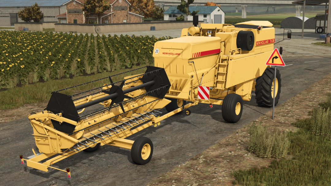 New Holland TX 32 mod in Farming Simulator 25 next to sunflower field.