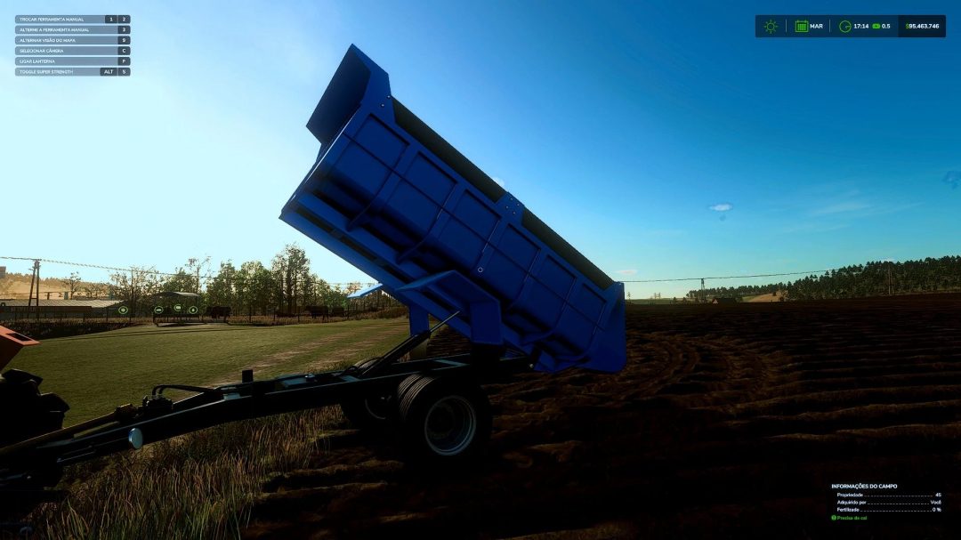 FS25 mod RB 12T v1.0.0.0 features a blue tipping trailer on a farm field at sunset.