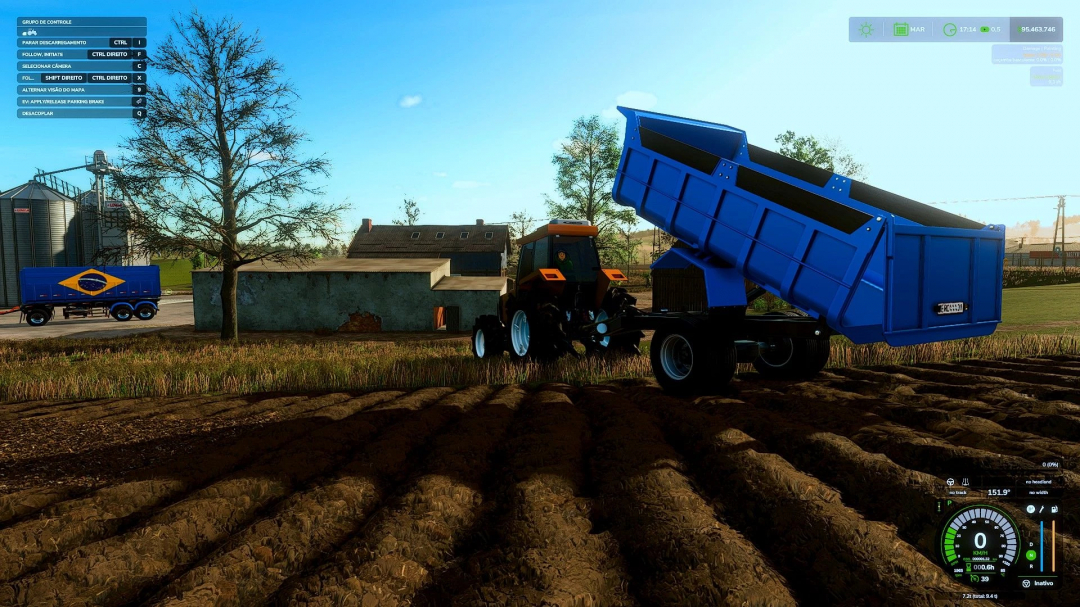 FS25 mod RB 12T trailer in a farm setting with tractor and plowed field.