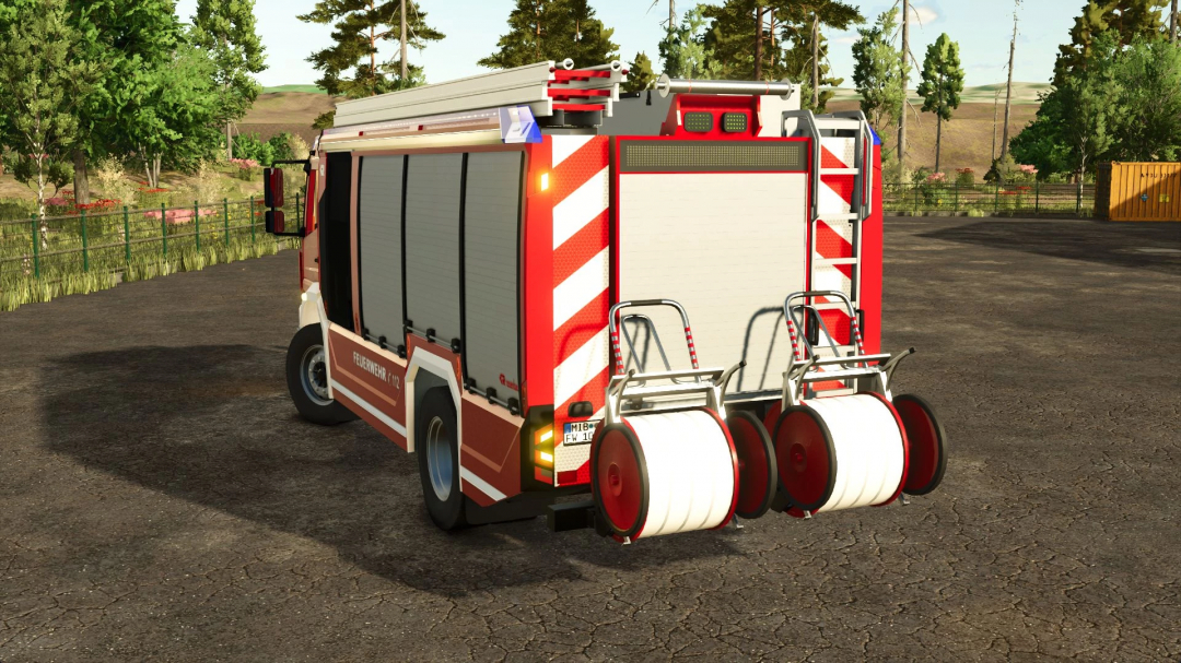 Rosenbauer AT3 Facelift mod for FS25, featuring a detailed fire truck with hose reels, set in Farming Simulator 25.