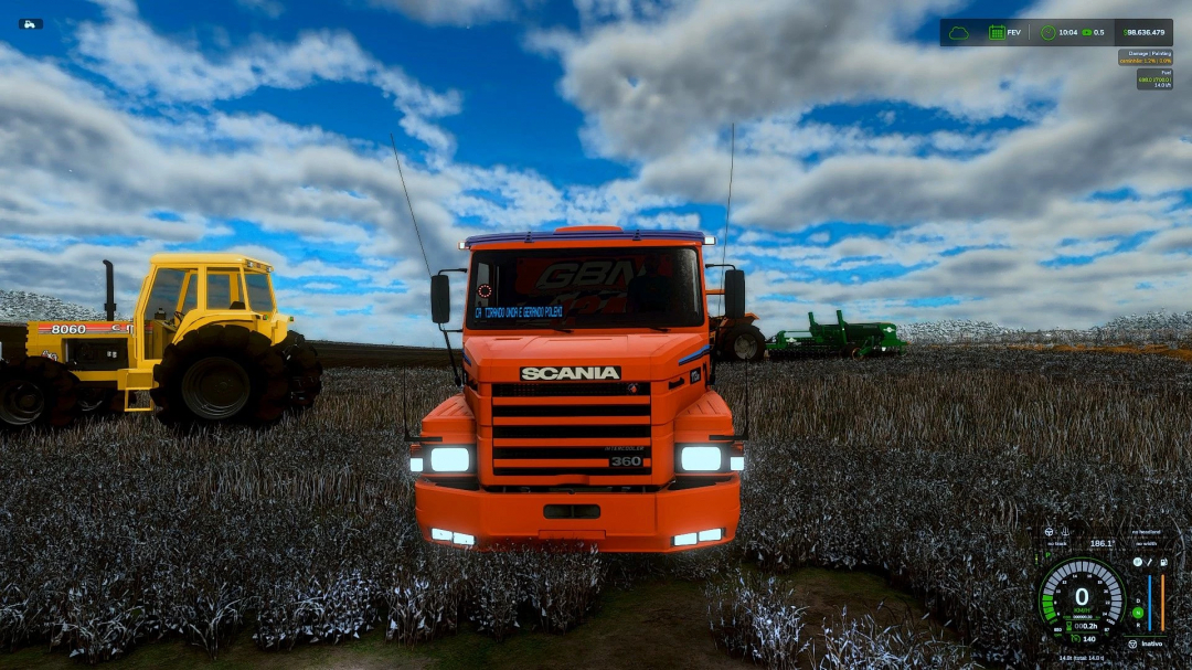 FS25 mod Scania T112 v1.0.0.0 in a field with clouds in Farming Simulator 25.