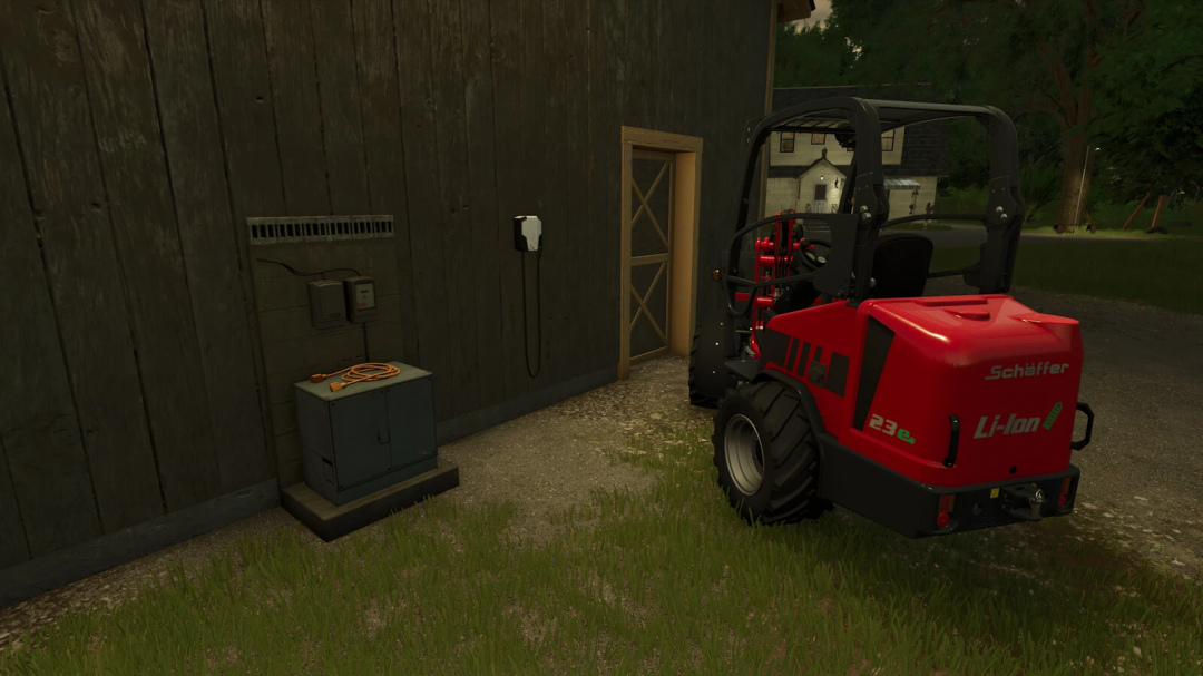 SCHÄFFER Miniloader 23e parked next to wallbox in FS25 mod.