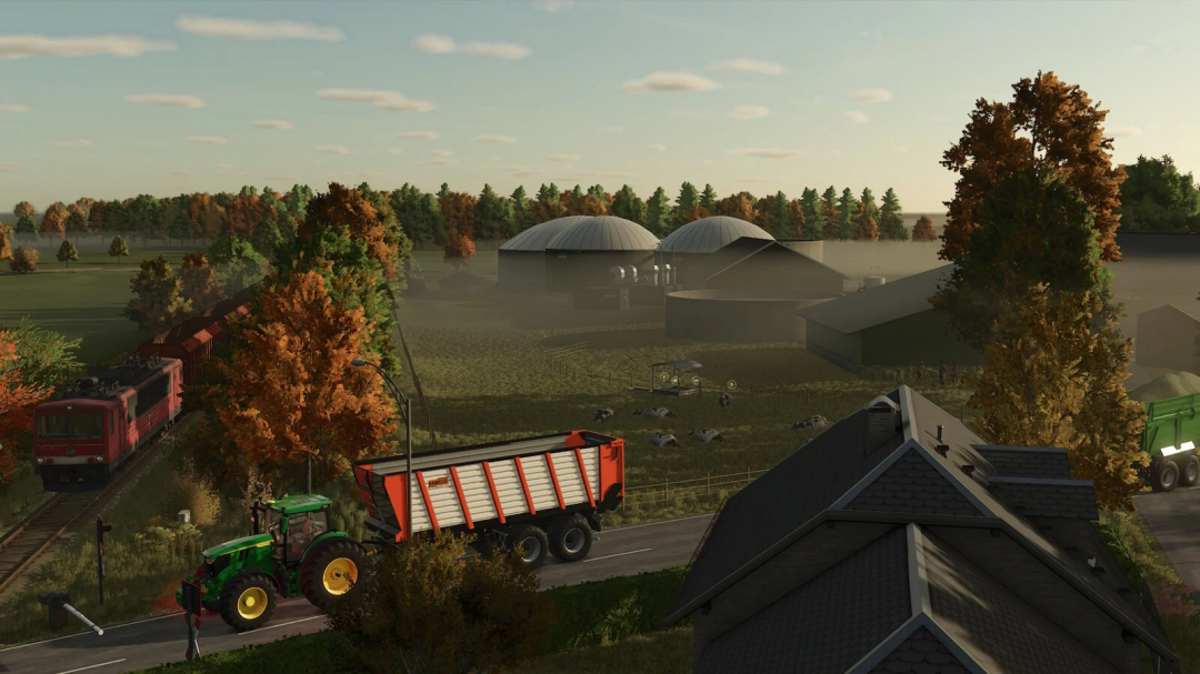 Scenic view of Schwesing Bahnhof mod in Farming Simulator 25, showing a train, tractor, and farmland with barns and trees.