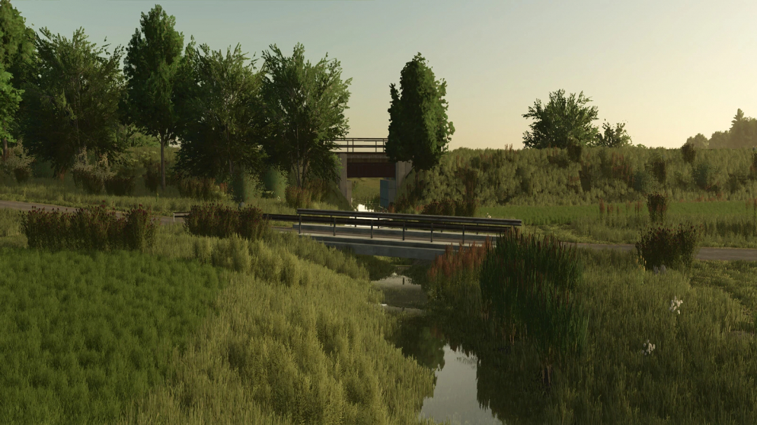 Scenic view of Schwesing Bahnhof mod in Farming Simulator 25 showing a bridge over a small stream surrounded by lush greenery. FS25 mods.