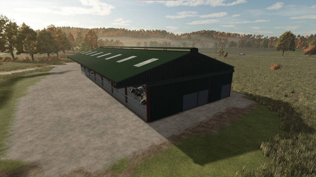 Slatted Cow Shed mod in FS25, showcasing a large green-roofed barn with cows inside, set in a scenic rural landscape.