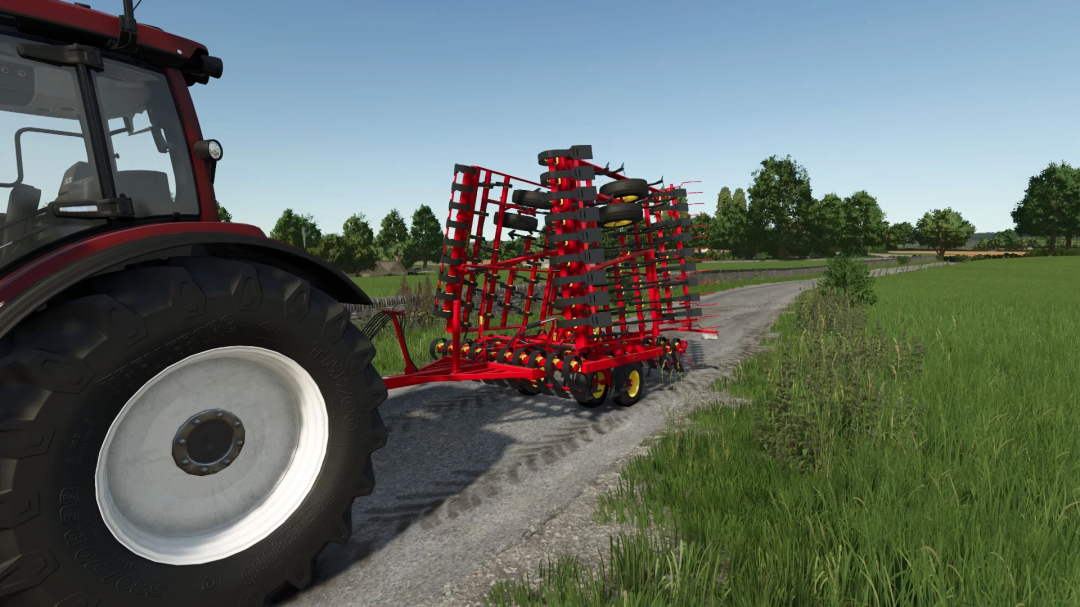 Väderstad NZ 600 cultivator mod in Farming Simulator 25, attached to a tractor on a rural road.