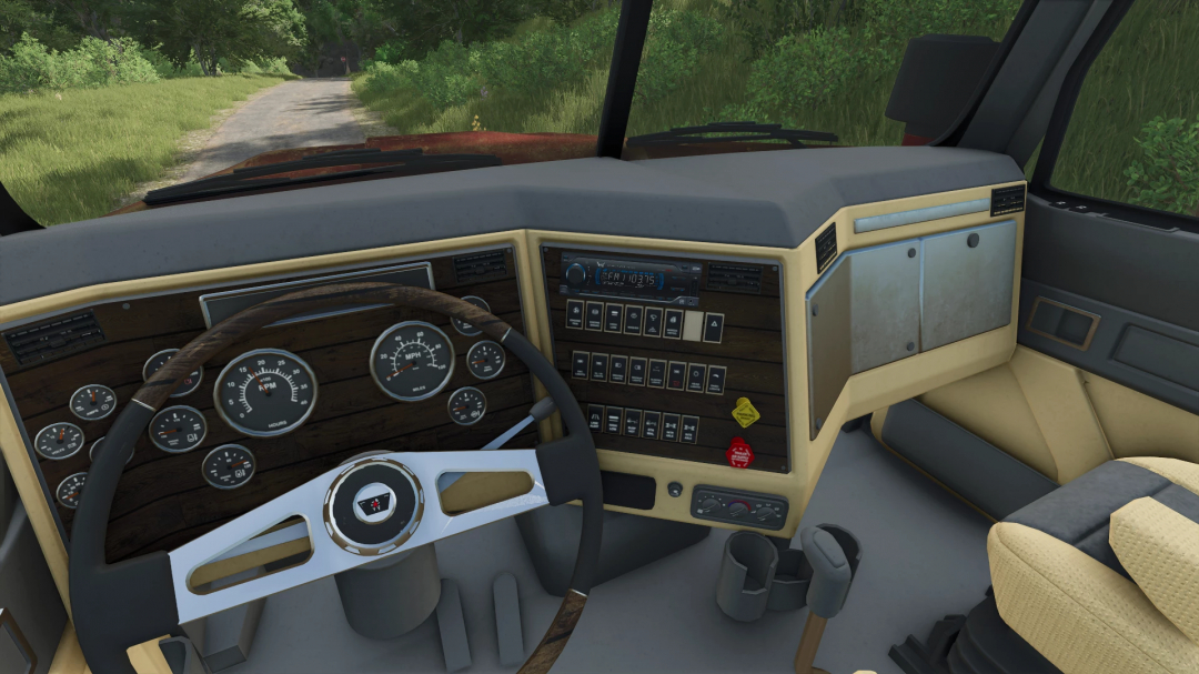 Interior view of Western Star SB v1.0.0.0 truck mod in FS25, showcasing detailed dashboard and steering wheel.