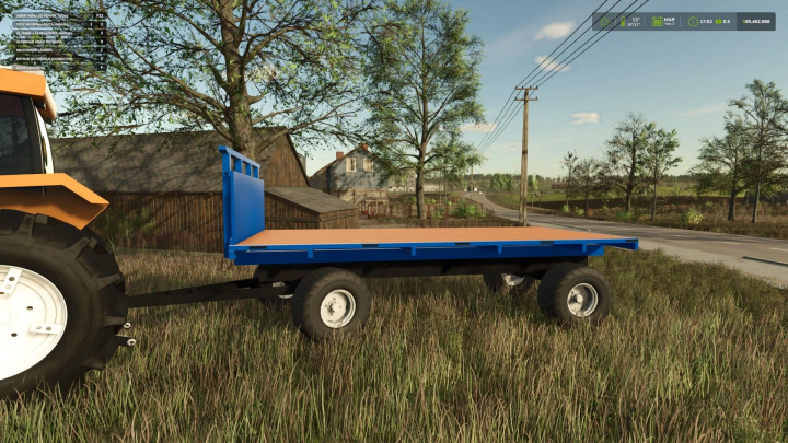 fs25-mods,  FS25 mod CARRETA TRITON v1.0.0.0, a blue trailer attached to a tractor, depicted in a rural farm setting.