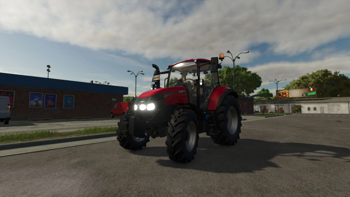 fs25-mods,  Case IH Luxxum 100-120 tractor mod in FS25, parked on a street with buildings and trees in the background.