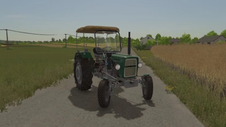 fs22-mods,  FS22 Ursus C330 mod for Farming Simulator 22 featuring a vintage green tractor on a rural road.