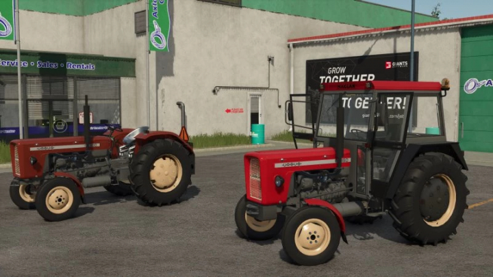 fs25-mods,  FS25 mods: Ursus C355 and C360 4x4 tractors parked outside in Farming Simulator 25.