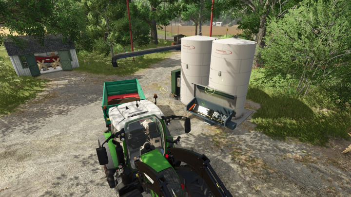 fs25-mods, Fermenter 60000L mod in FS25, showing two large silos beside a tractor in a farm setting.