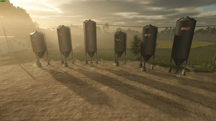 fs25-mods, Karma Silo Bins mod in Farming Simulator 25, displaying six large metal silos in a rural setting.