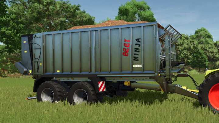 fs25-mods,  Trailer with Beet Cutter mod for FS25 in a grassy field, showcasing its functionality.