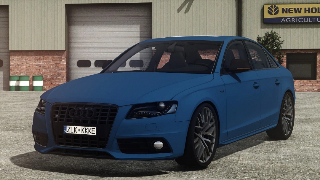 Blue Audi A4 mod for Farming Simulator 25 parked outside a warehouse. FS25 mods enhance gameplay.