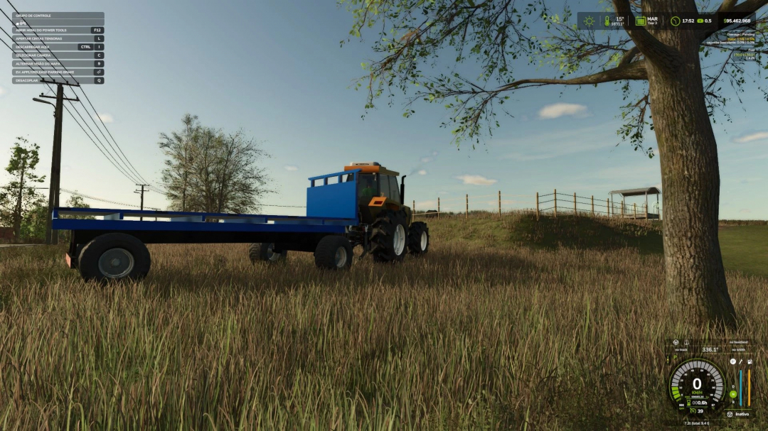 FS25 mod CARRETA TRITON v1.0.0.0, a blue trailer attached to a tractor in a grassy field under a tree.