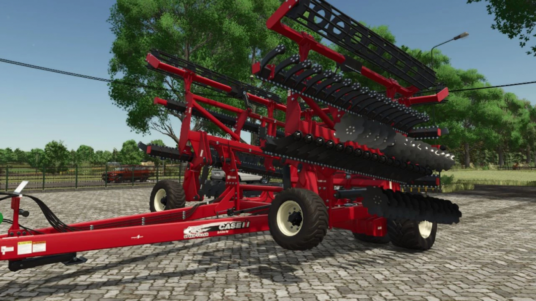 Case IH Speed-Tiller 475 mod for FS25 showing detailed red farming equipment in a rural setting.