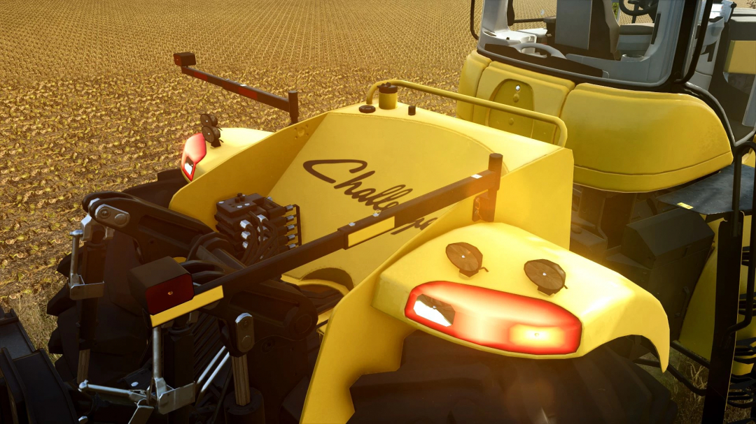 Close-up of Challenger MT900E tractor in FS25 mod, highlighting yellow design and rear details on a field.