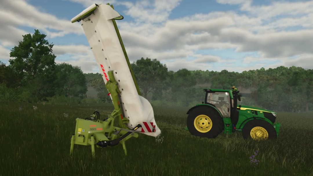 Claas Disco 3900 mod in FS25 showcases a tractor with a grass mower in a field setting.