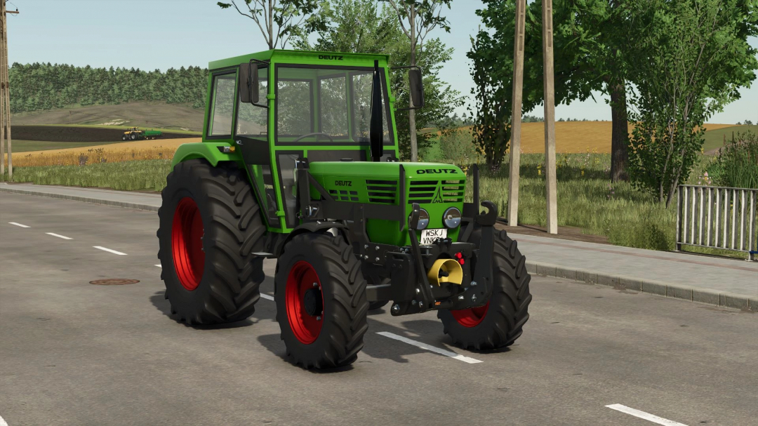 Green Deutz D06 tractor mod from FS25 on a rural road in Farming Simulator 25.