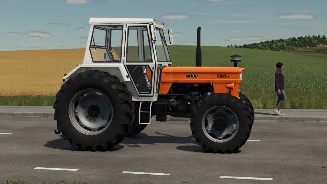 Fiat 1300 DT mod in FS25, featuring a classic tractor design on a rural road.