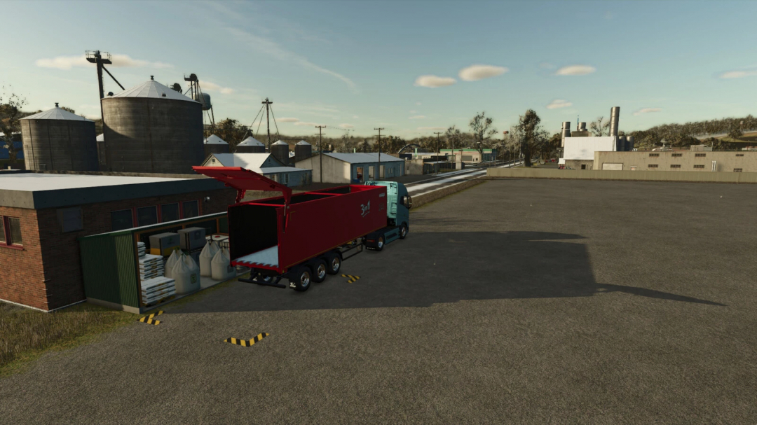 Field Storage mod in FS25 featuring a red trailer next to storage containers and silos.