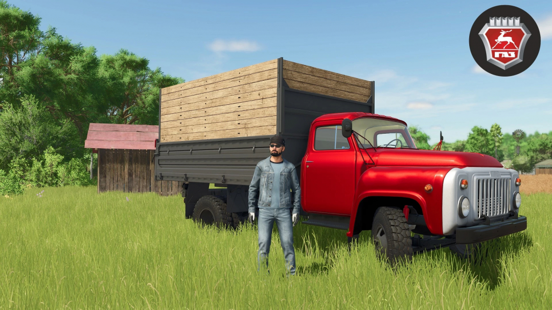 A red GAZ 52/53 truck mod in Farming Simulator 25 with a character standing in a grassy field.