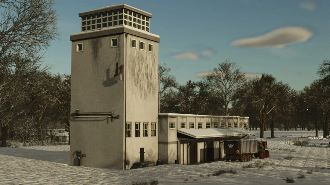 Grain Flourmill mod for FS25, showing a tall industrial building in snowy scenery.