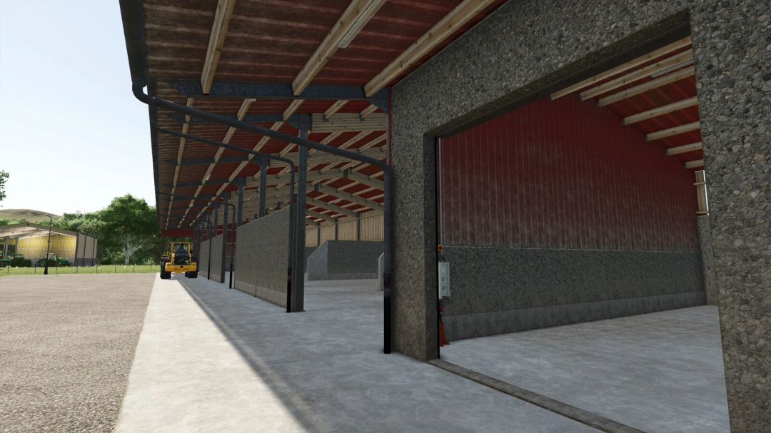 Interior view of Grain Hall mod for FS25, showing spacious storage area with concrete floor and open garage in Farming Simulator 25.