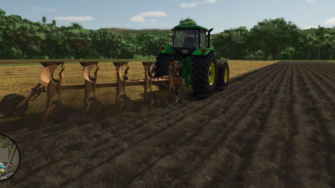 FS25 mod Huard 475 v1.0.0.0 showing a tractor plowing a field in Farming Simulator 25.