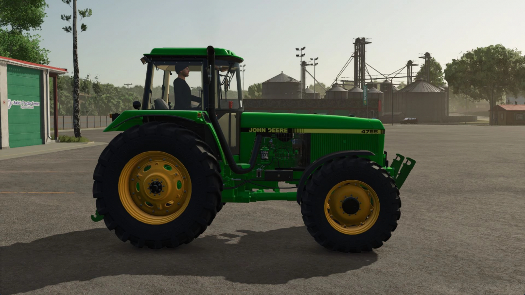 John Deere 4755 tractor mod in Farming Simulator 25, shown in a farm setting. FS25 mods enhance gameplay realism.