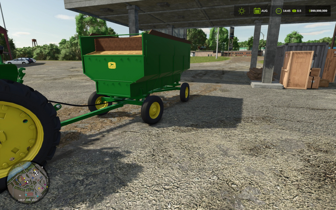 John Deere Barge Wagon mod showcased in Farming Simulator 25, parked under a shed.